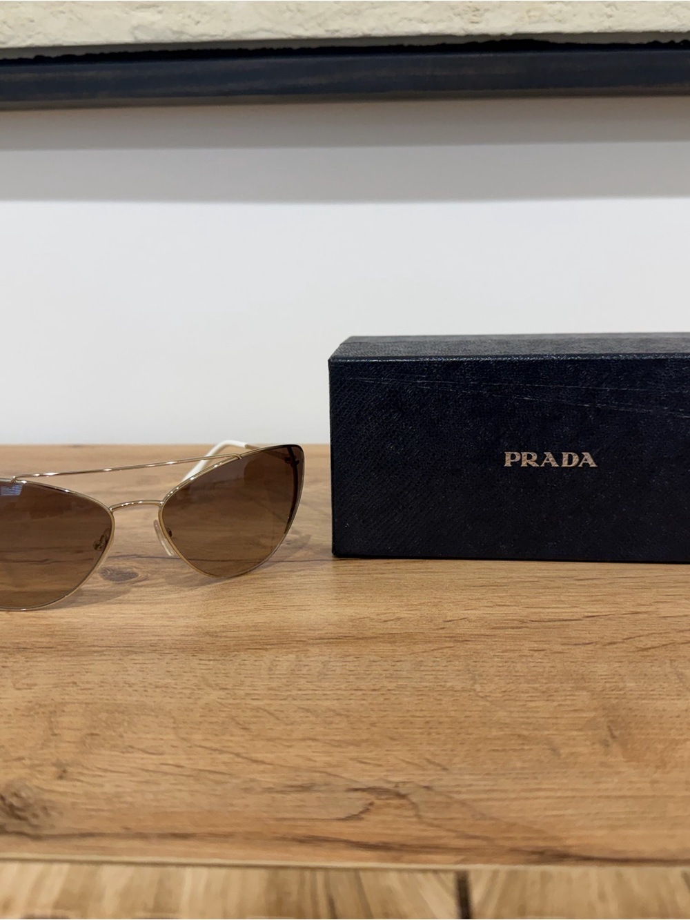 Prada Cat-Eye Sunglasses in Gold and Brown